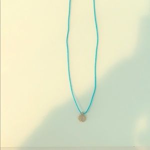 blue string sun necklace
